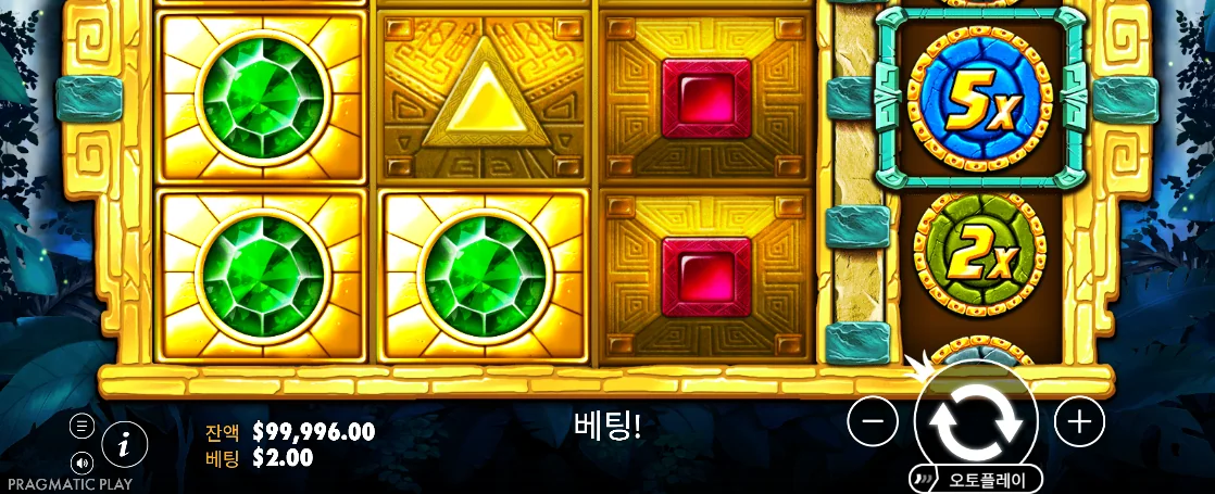 쌓인 초록 보석과 5배·2배 원판이 보이는 아즈텍 젬스 화면