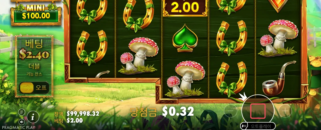 붉은 정지 버튼과 베팅 정보가 보이는 와일드 와일드 리치스 회전 화면
