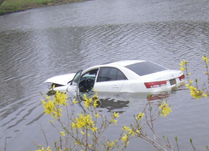 car in a pond