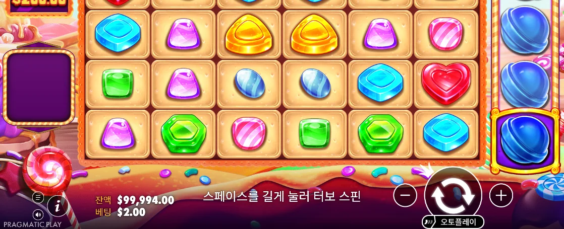 여러 색 캔디와 파란 승수 원판 세 개가 보이는 캔디 블리츠 화면